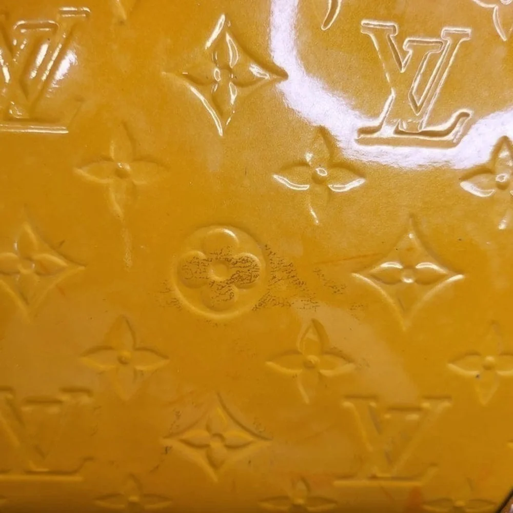 𝅺louis VUITTON VERNIS STA. MONICA CLUTCH